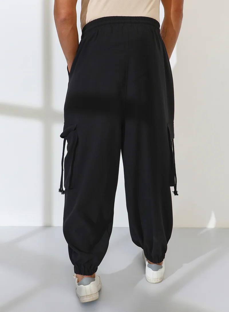 CAHOOT  Men's Charcoal Black Cuffed Baggy Utility Trousers For Casual Wear | Mid-Rise | 4 Pockets | Drawstring Closure | Cargo Pants Crafted With Comfort Fit For Everyday Wear for Men | Best Price UAE